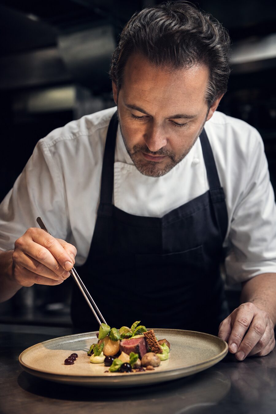 Chef Daniel Moss in the EMBER & OAK kitchen